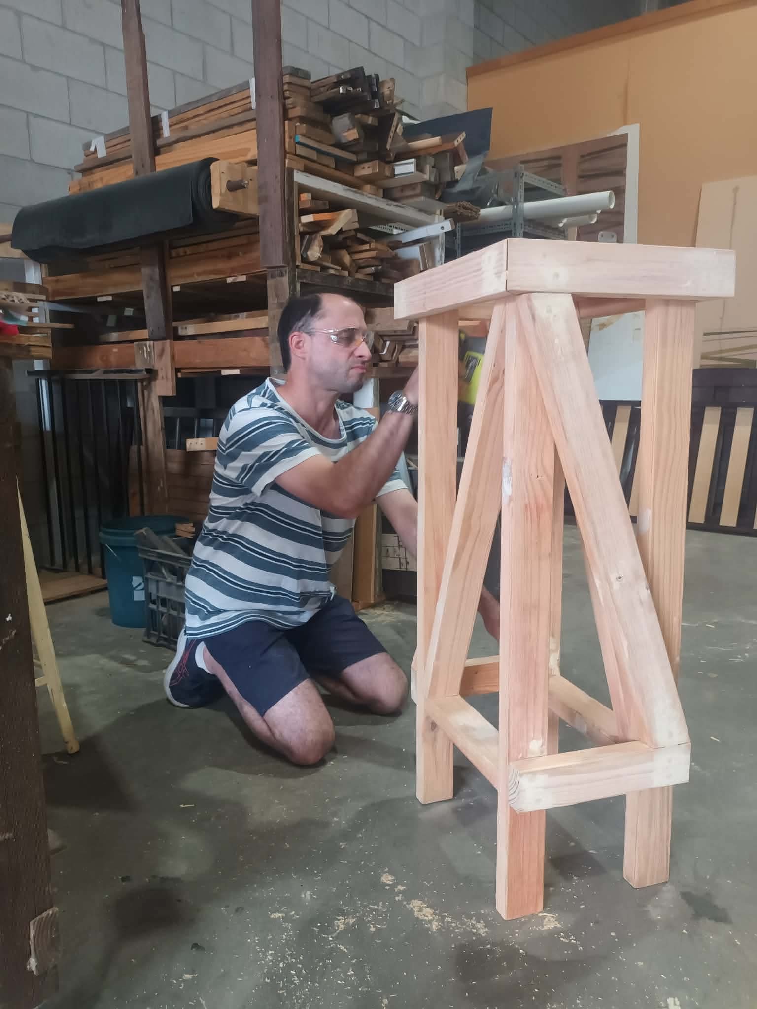 Participant building a timber project